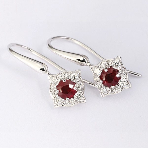 White gold ruby and diamond drop earrings.