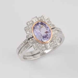 18 carat white and rose gold oval Tanzanite and diamond ring