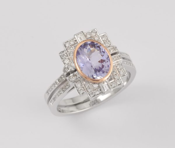 18 carat white and rose gold oval Tanzanite and diamond ring