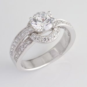 18 carat white gold multi diamond ring with 'looped' shoulders.