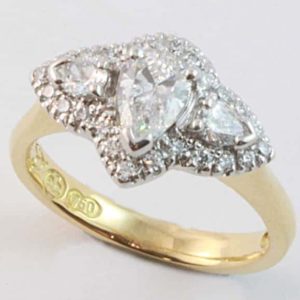 pear shaped diamond halo cluster ring, Abrecht Bird, Abrecht Bird Jewellers, hand made pear engagement ring, pear shaped engagement ring, pear shaped cluster