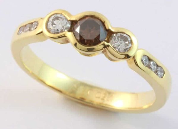 cognac diamond ring, diamond three stone ring, round cognac diamond, yellow gold diamond ring, three stone ring, Abrecht Birdm,