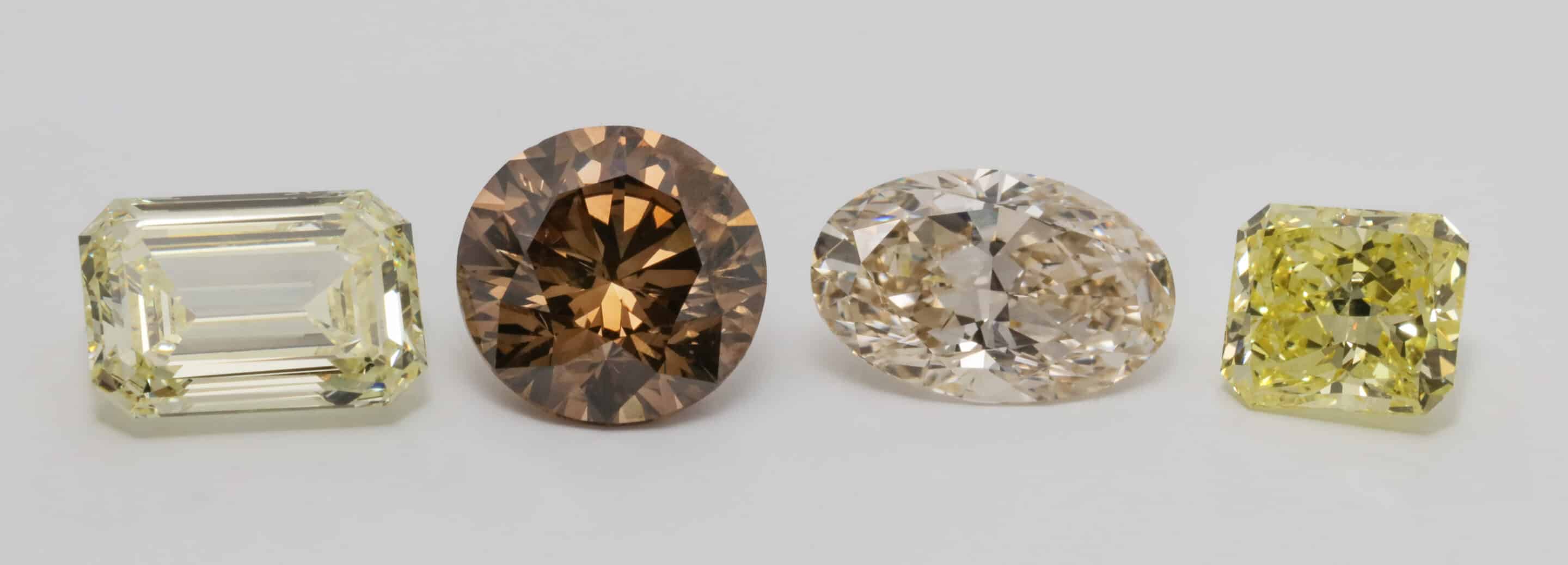 coloured diamonds, yellow diamond, cognac diamond, oval diamond, round diamond, emerald cut diamond
