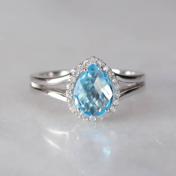 Abrecht Bird, Abrecht Bird Jewellers, topaz, checkerboard, pear shape, diamonds, white gold, halo , cluster ring, blue,